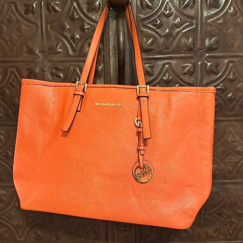 Michael Kors orange purse 11” x 16”